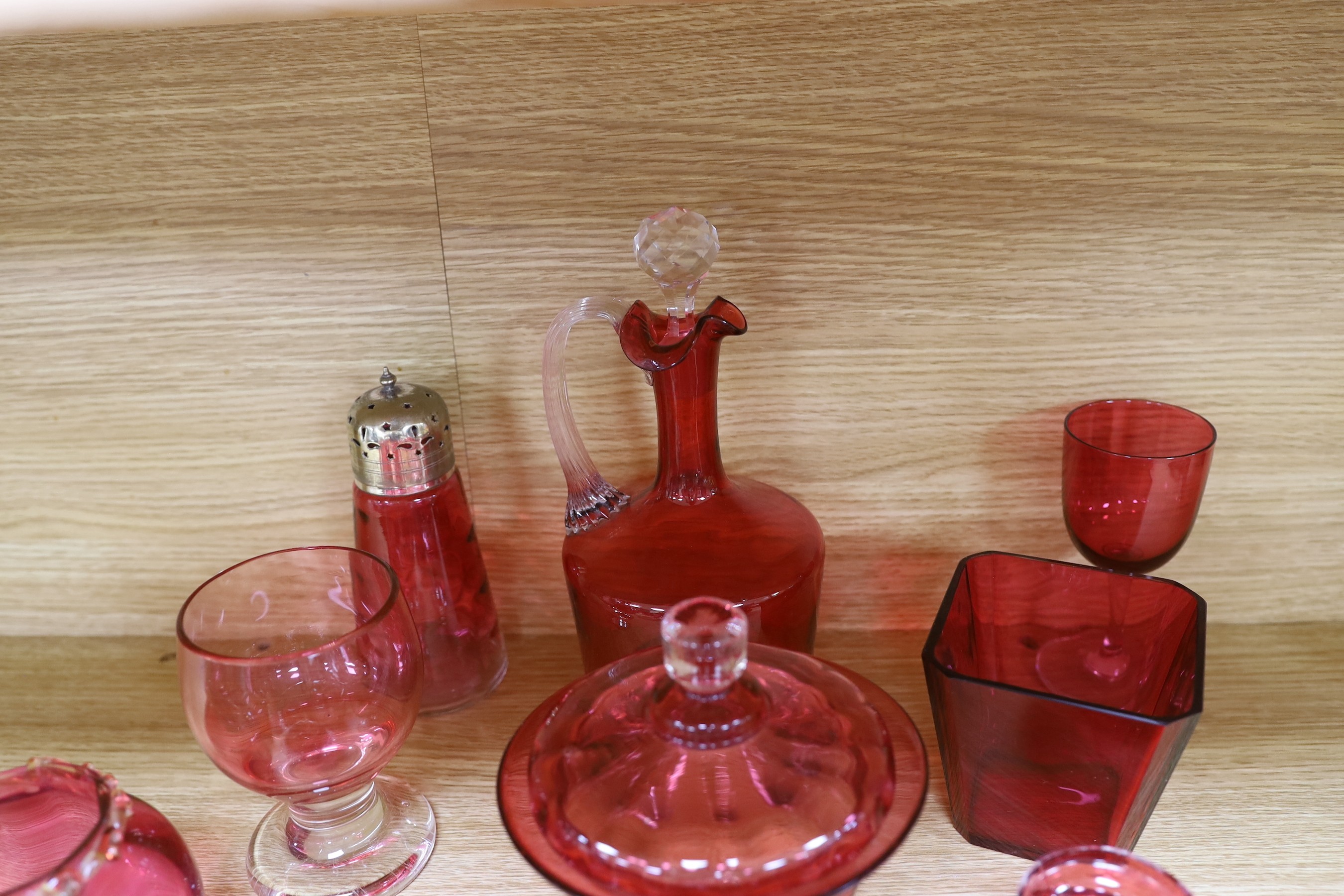 A collection of Cranberry glassware